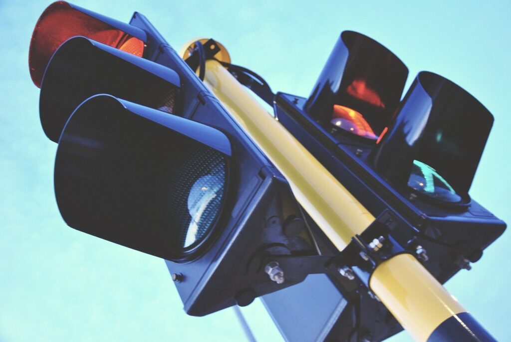 RAG - Red Amber Green - is a common status color coding to use in a SteerCo meeting agenda, it resembles a traffic light like the one in the picture