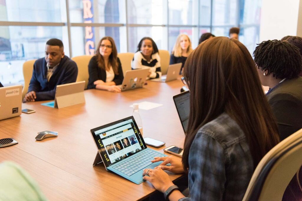 SteerCo meaning: a steering commitee is a group of people meeting regularly around a table to discuss the status of a project